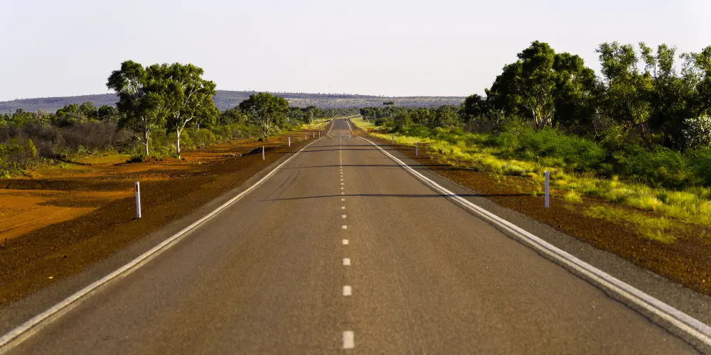 A road in the middle of an NT bush landscape
